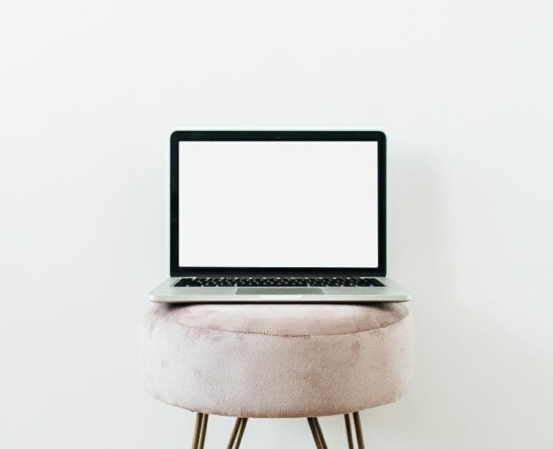 types of minimalists: laptop sitting on a stool