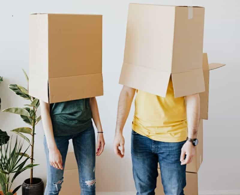 How to know when you have too much stuff couple with boxes over their heads