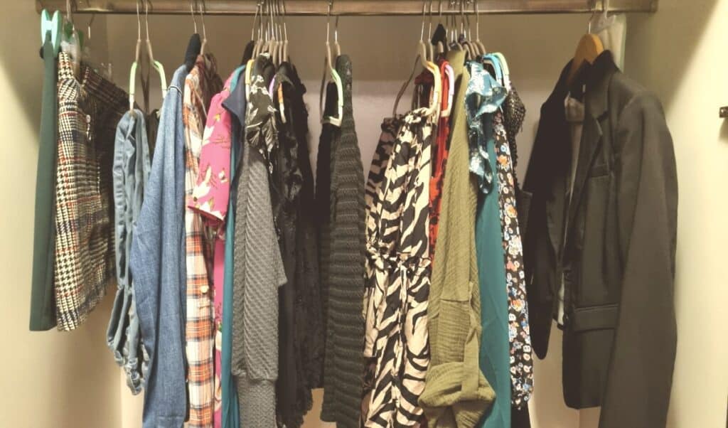 Clothing hanging in my minimalist wardrobe