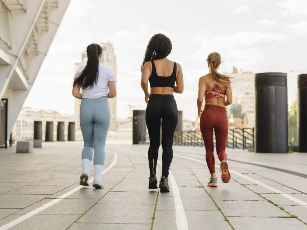 Minimalist hobbies: 3 female friends jogging